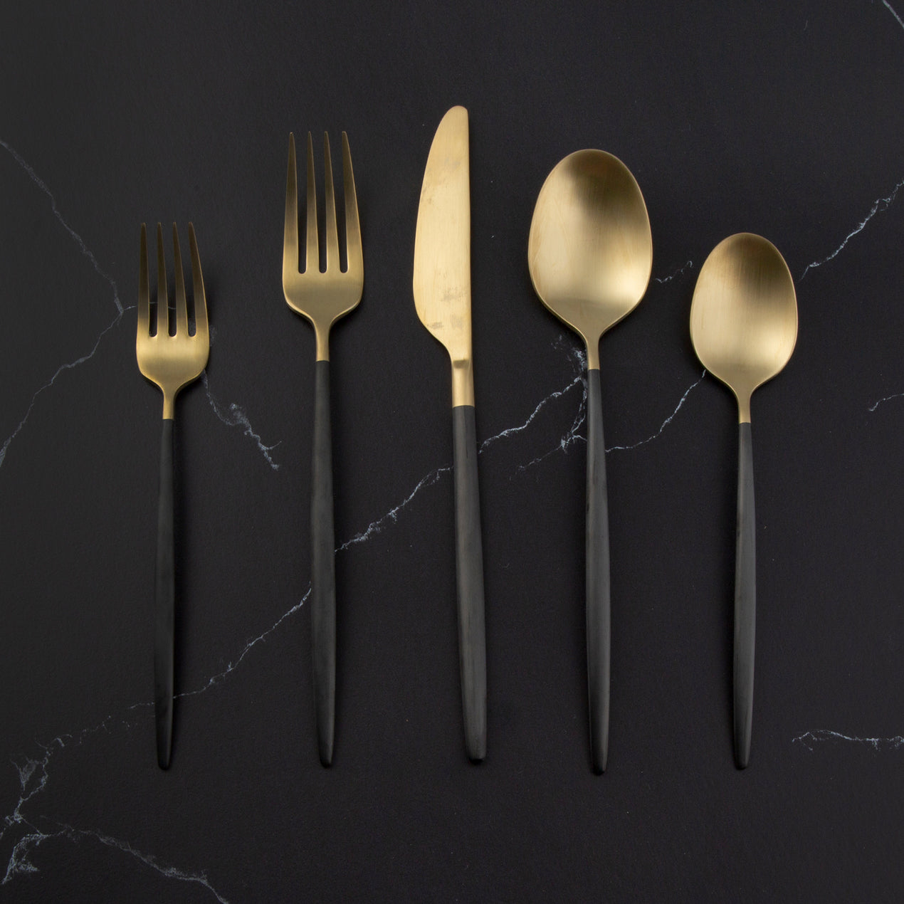 flatware set in brushed gold & black | parker + gibbs